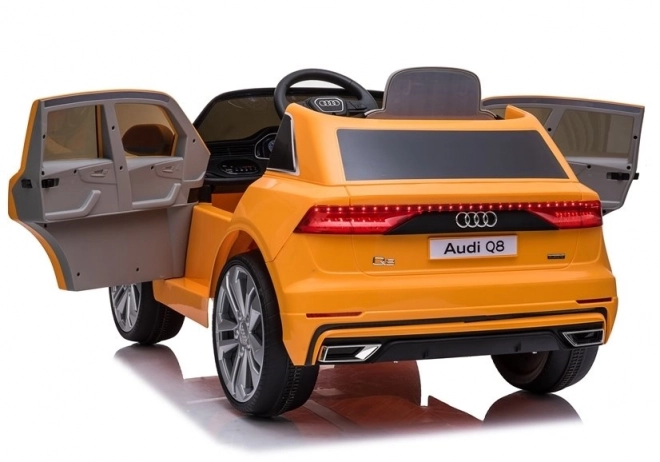 Gelber Audi Q8 Elektroauto für Kinder