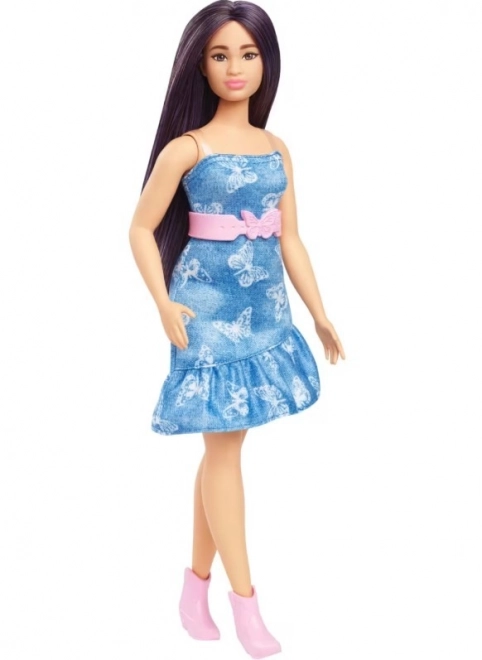 Barbie Puppe in blauen Kleidern mit Schmetterlingen