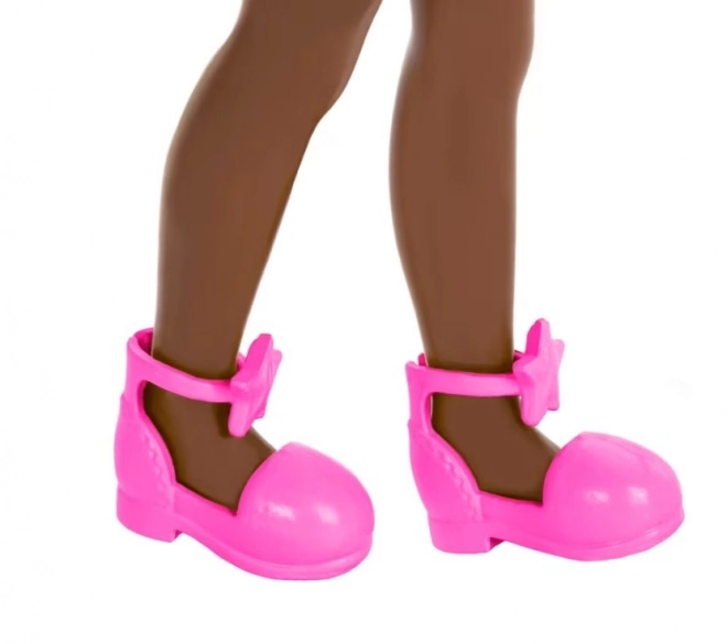 Barbie Chelsea Puppe mit lila Blumenkleid