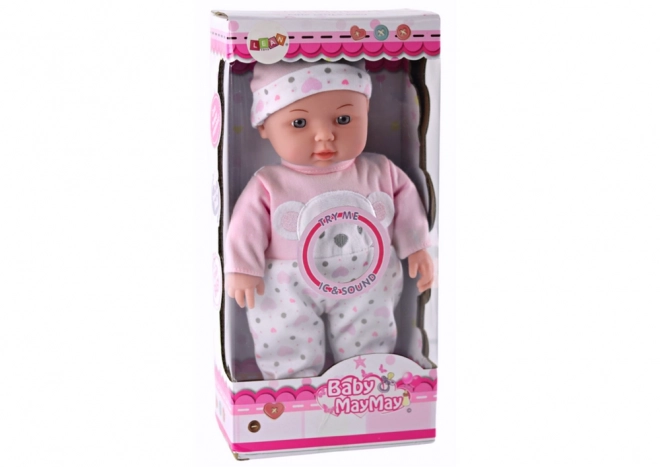 Babypuppe mit rosa Pyjama und Bärchenmütze mit Geräuschen