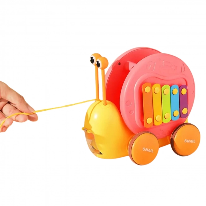 Multifunktionales WOOPIE Spielzeug Schnecke mit Xylophon und Autoabschuss