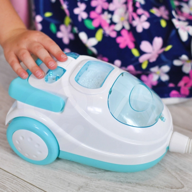 Interaktiver Kinderstaubsauger mit Saugfunktion Woopie