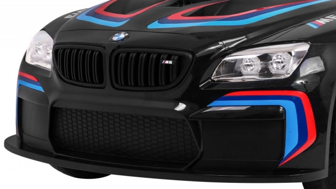 BMW M6 GT3 Spielzeugauto auf Batterie für Kinder schwarz + Belüftung + MP3-Sounds Lichter + Fernbedienung