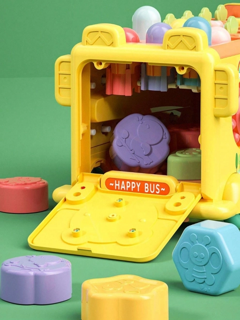 Interaktiver Montessori Schulbus mit Hammer und Xylophon
