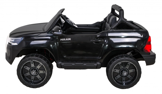 Toyota Hilux Batterie für Kinder schwarz + Antrieb 4x4 + Fernbedienung + 2 Gepäckträger + MP3-Radio + LED-Diode