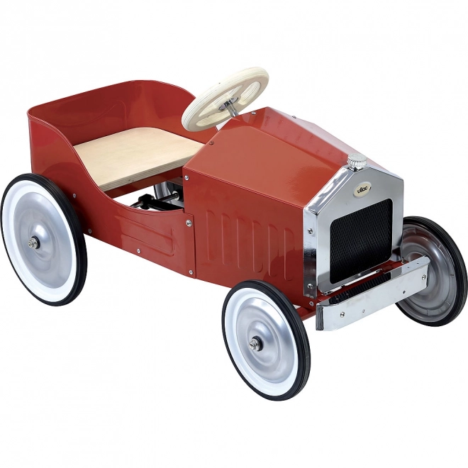 Rotes Vintage-Tretauto mit Holzdetails