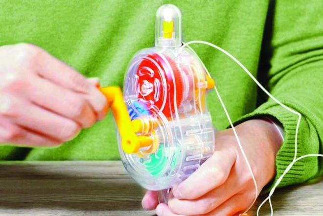 Transparente Lampe mit farbigen Zahnrädern