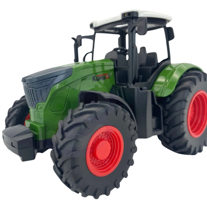 Traktor mit Gummirädern Grün