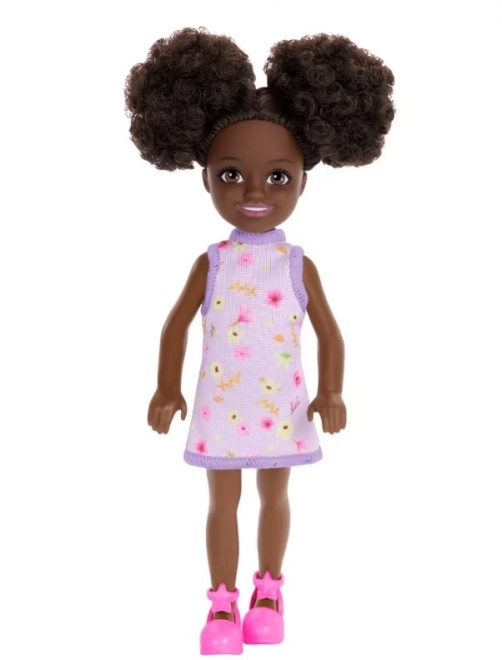 Barbie Chelsea Puppe mit lila Blumenkleid