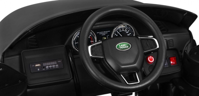 Land Rover Discovery für Kinder schwarz + Fernsteuerung + 5-Punkt-Sicherheitsgurte + Sitzverstellung + EVA + MP3 LED