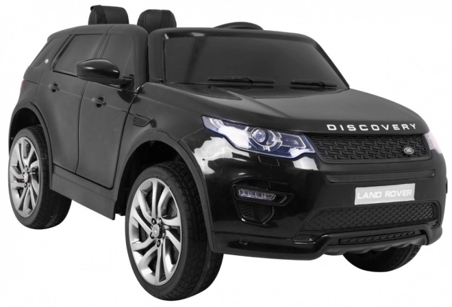 Land Rover Discovery für Kinder schwarz + Fernsteuerung + 5-Punkt-Sicherheitsgurte + Sitzverstellung + EVA + MP3 LED