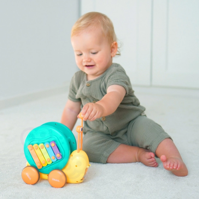 Woopie 4-in-1 Ziehspielzeug Schnecke mit Xylophon und Sensorik
