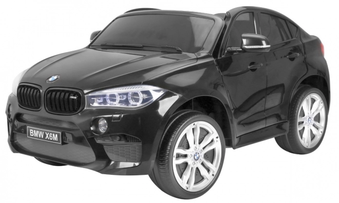 BMW X6M XXL pro 2 Kinder Lack schwarz + Fernbedienung + Ökoleder + Sicherheitsgurte + Sanfter Start + MP3 + LED