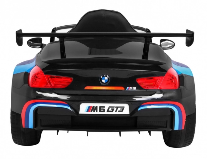 BMW M6 GT3 Spielzeugauto auf Batterie für Kinder schwarz + Belüftung + MP3-Sounds Lichter + Fernbedienung