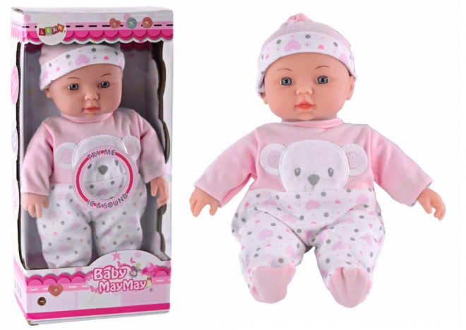 Babypuppe mit rosa Pyjama und Bärchenmütze mit Geräuschen