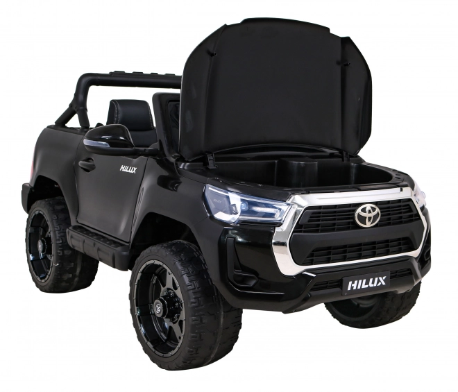 Toyota Hilux Batterie für Kinder schwarz + Antrieb 4x4 + Fernbedienung + 2 Gepäckträger + MP3-Radio + LED-Diode