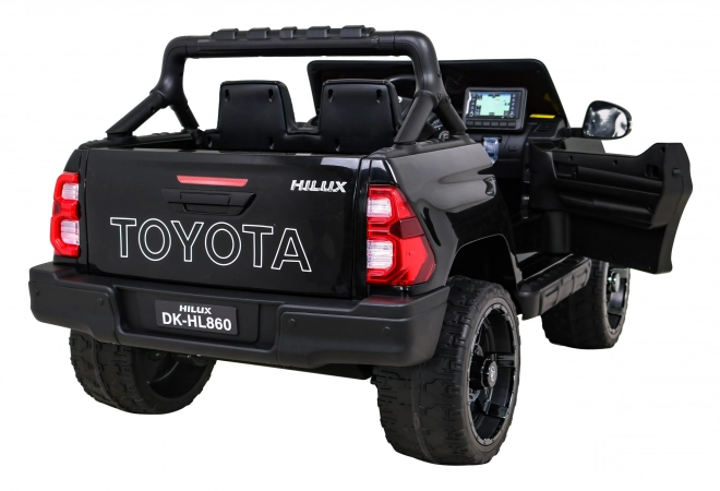 Toyota Hilux Batterie für Kinder schwarz + Antrieb 4x4 + Fernbedienung + 2 Gepäckträger + MP3-Radio + LED-Diode