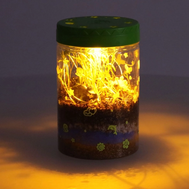 Terrarium zum Pflanzenanbau mit LED-Lampe und Dinosauriern