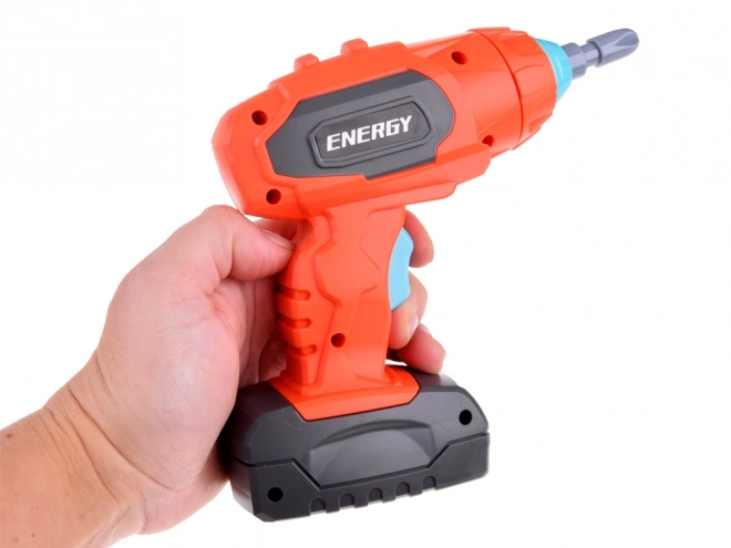 Werkzeugkasten für kleine Handwerker mit Bohrmaschine und Schrauben