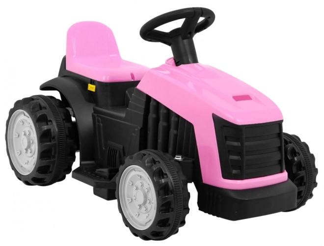 Grüner Traktor mit Anhänger – rosa