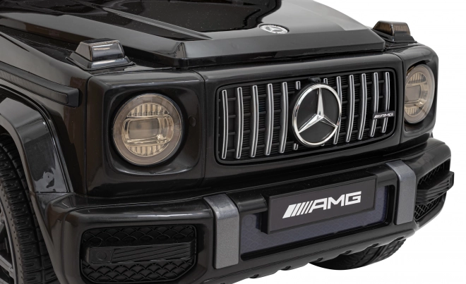 Mercedes AMG G63 für Kinder schwarz + Fernbedienung + MP3 LED + langsamer Start + EVA + Gurte
