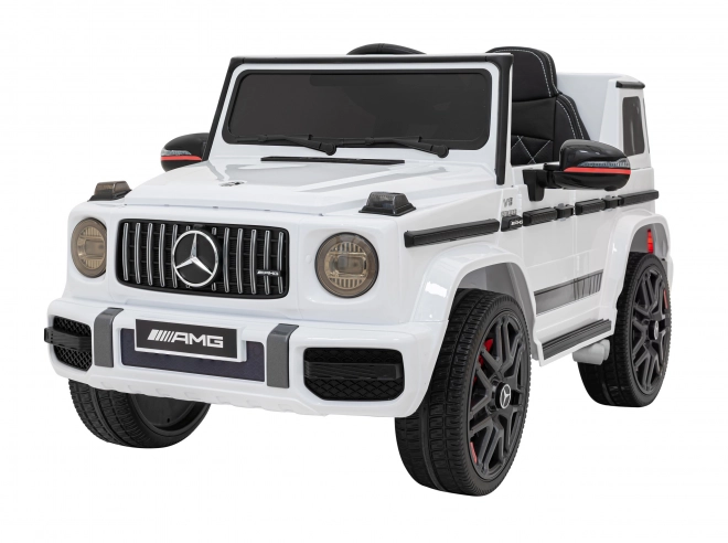 Mercedes AMG G63 für Kinder weiß + Fernbedienung + MP3 LED + langsamer Start + EVA + Gurte