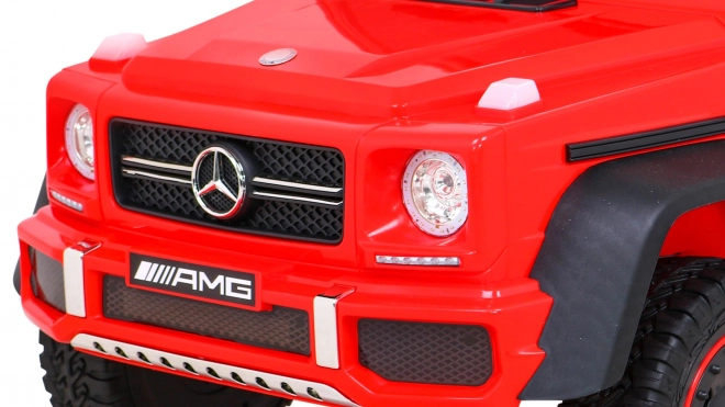 Mercedes G63 AMG Auto mit Batterie, Rot + Fernsteuerung + 6 EVA-Räder + Sanfter Start + MP3 LED