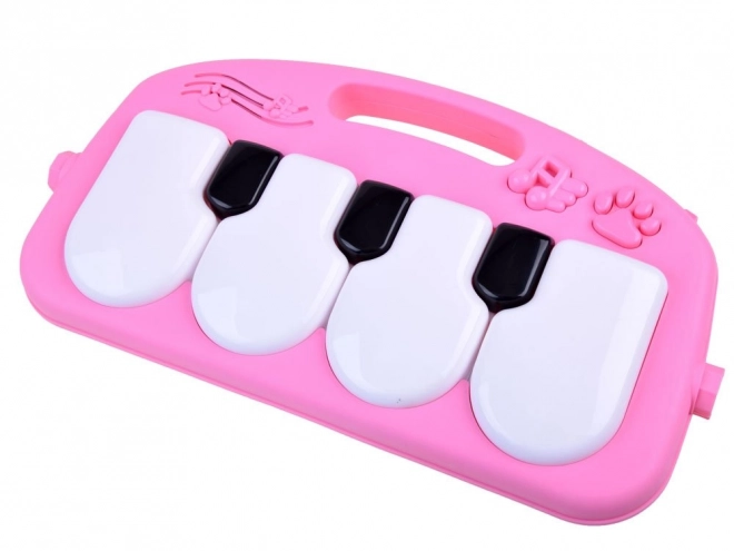 Edukative Babyspielmatte mit Piano und Projektor – rosa