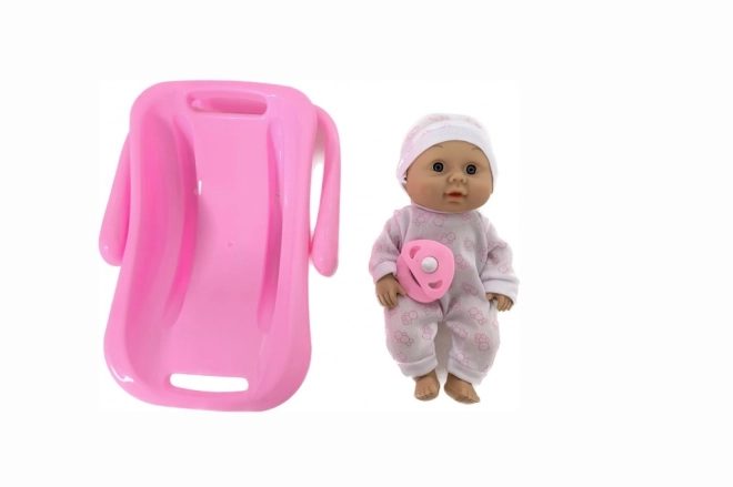 Puppe mit Tragehilfe