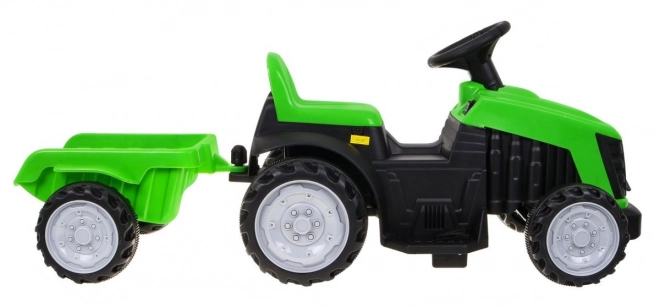 Grüner Traktor mit Anhänger