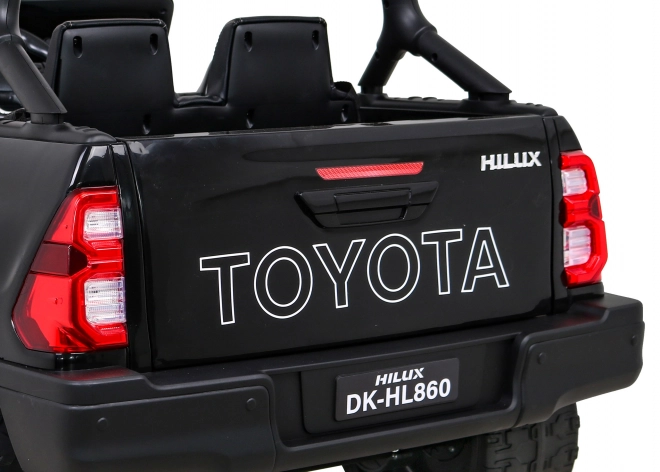 Toyota Hilux Batterie für Kinder schwarz + Antrieb 4x4 + Fernbedienung + 2 Gepäckträger + MP3-Radio + LED-Diode