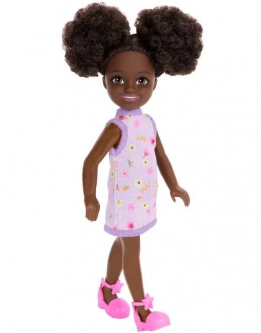 Barbie Chelsea Puppe mit lila Blumenkleid