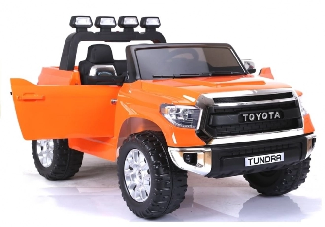 Spielzeugauto Elektrofahrzeug TOYOTA Tundra Orange