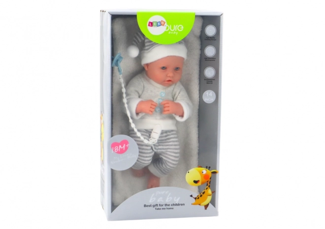 Baby Puppe mit Weiß-Grauem Streifen Outfit