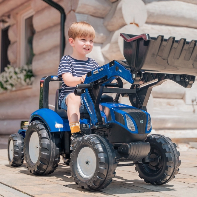 Falk Trettraktor New Holland mit Anhänger