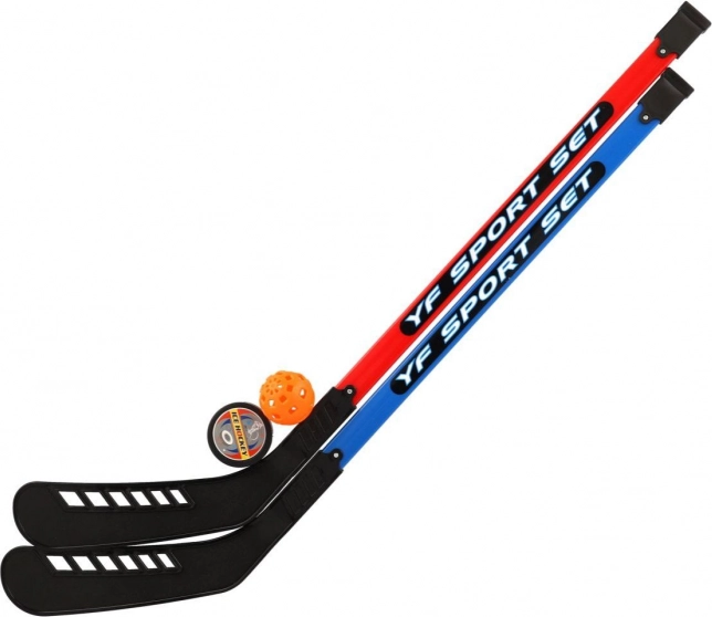 Set von Hockeyschlägern für Feldhockey mit Floorballball und Puck