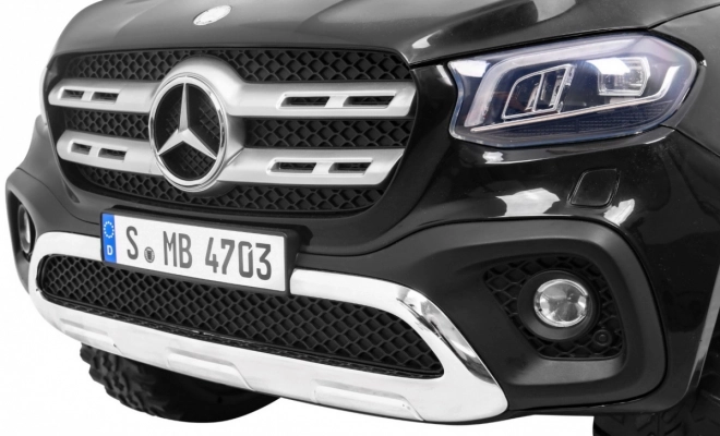 Mercedes Benz Klasse X für Kinder schwarz + Fernbedienung + 4x4 + MP4 + Träger für Gepäck + LED + EVA