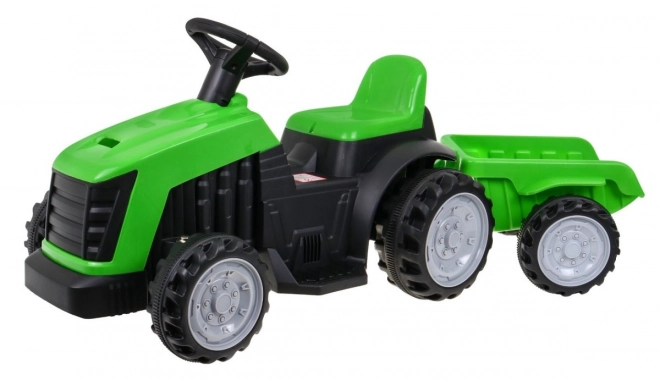 Grüner Traktor mit Anhänger