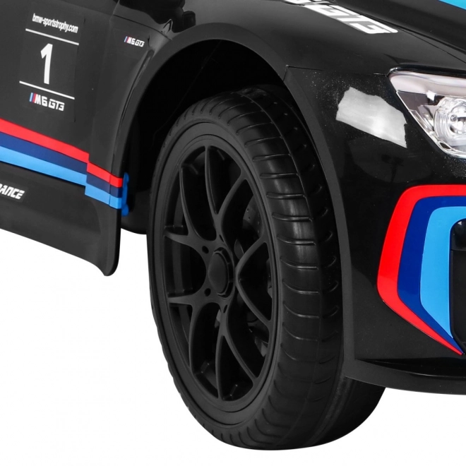 BMW M6 GT3 Spielzeugauto auf Batterie für Kinder schwarz + Belüftung + MP3-Sounds Lichter + Fernbedienung