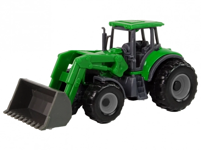 Kleiner Grüner Traktor mit Schaufel