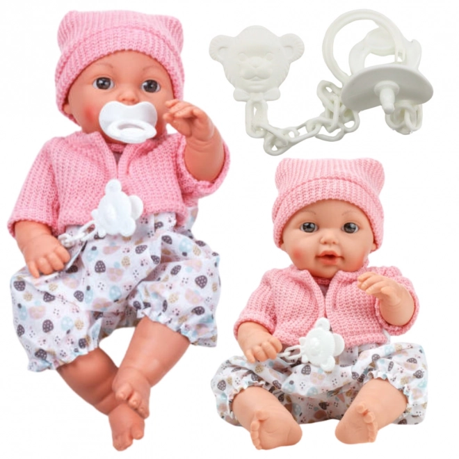Puppe Baby mit Mütze und Geräuschen