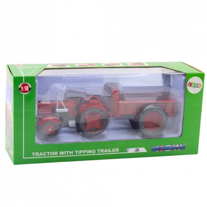 Roter Metalltraktor mit Anhänger im Maßstab 1:18