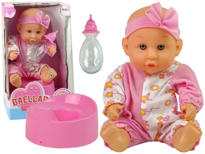 Baby-Puppe im rosa Pyjama mit Zubehör