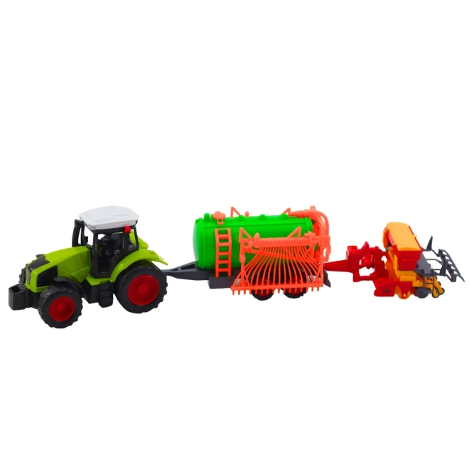 Traktor mit Zisterne und Heuwender