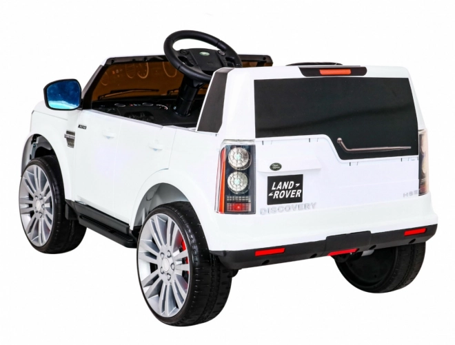 Land Rover Discovery Elektrisches Kinderauto weiß + Fernbedienung + EVA-Räder + langsamer Start + MP3 Radio