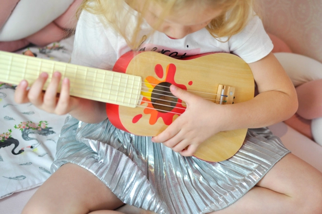 Holzspielzeug Gitarre mit Plektrum
