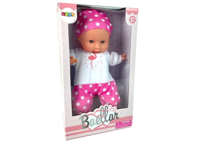 Baby-Puppe rosa Pyjama mit Punkten 30 cm