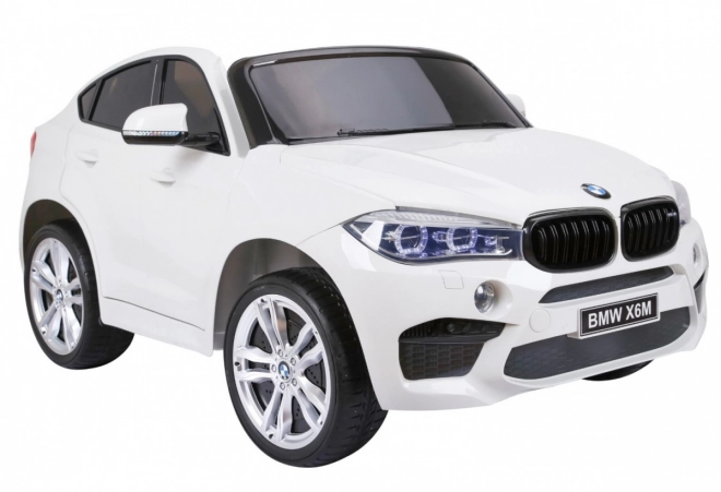 BMW X6M XXL pro 2 Kinder Weiß + Fernsteuerung + Eco-Leder + Sicherheitsgurte + langsamer Start + MP3 USB + LED