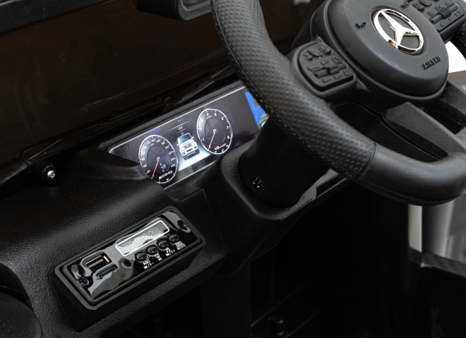 Mercedes AMG G63 für Kinder schwarz + Fernbedienung + MP3 LED + langsamer Start + EVA + Gurte