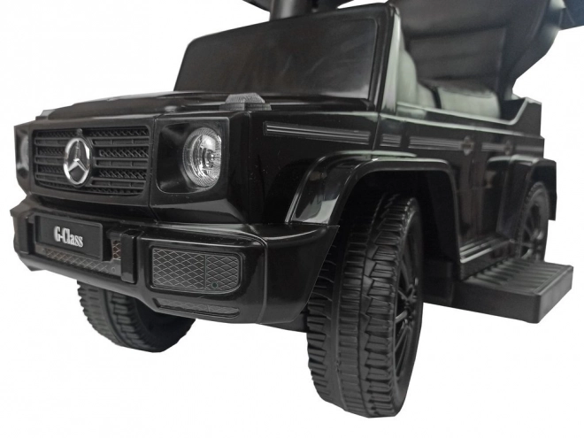 Kinderauto Mercedes G-Klasse schwarz mit Schiebestange